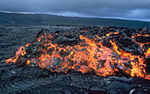 ʻAʻa advances over solidified pāhoehoe on Kīlauea, Hawaiʻi