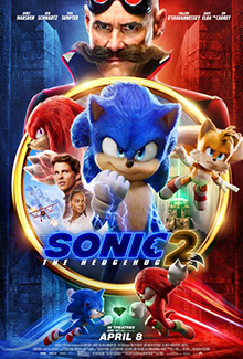 In the foreground center, Sonic, Tails, Knuckles, Tom and Maddie are within a ring with a dual background of a snowy mountain and a labyrinth with a green beam shooting from a pyramid; behind the ring is Doctor Robotnik; the background is stylistically divided into red and blue with Sonic and Knuckles in their respective colors running face to face in front of the Master Emerald.