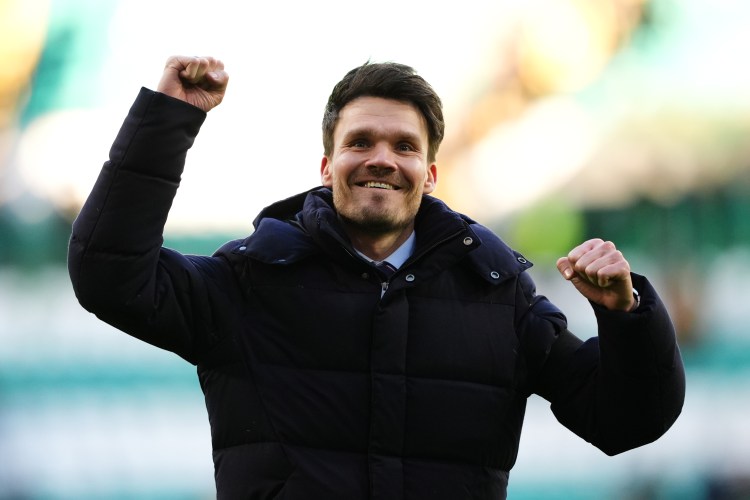 Rangers manager Danny Rohl salutes fans at Celtic Park.