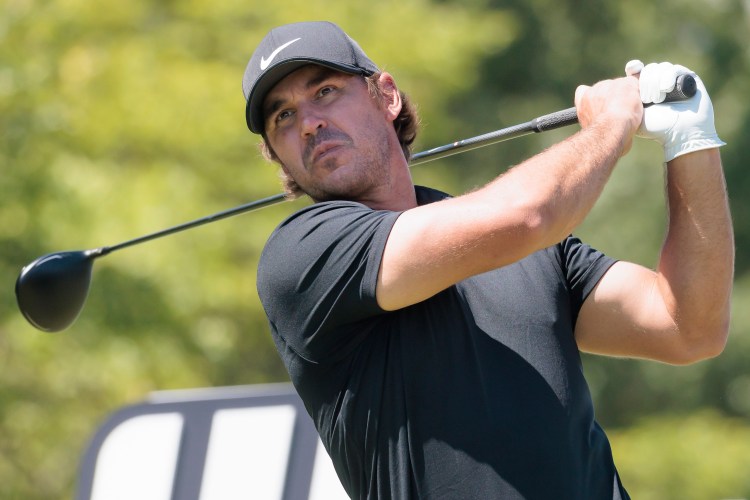 Brooks Koepka tees off during the third round of the LIV Golf tournament.