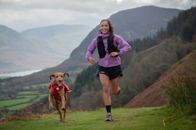 Ultramarathon runner Sarah Perry training on Burnbank Fell with her dog, Murphy.