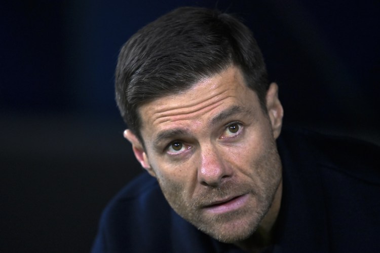 Xabi Alonso, coach of Real Madrid, watches a match from the sidelines.